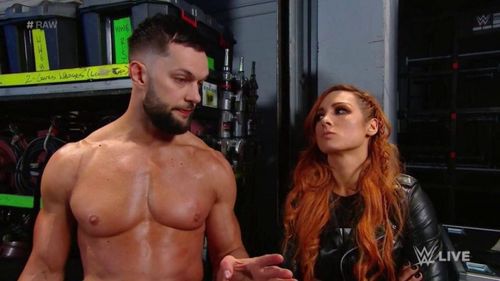 Finn Balor with Becky Lynch