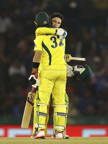 The centurion Handscomb hugs Maxwell