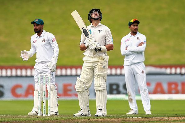 Ross Taylor looking skyward paying respect to Martin Crowe after going past his tally of 17 hundreds