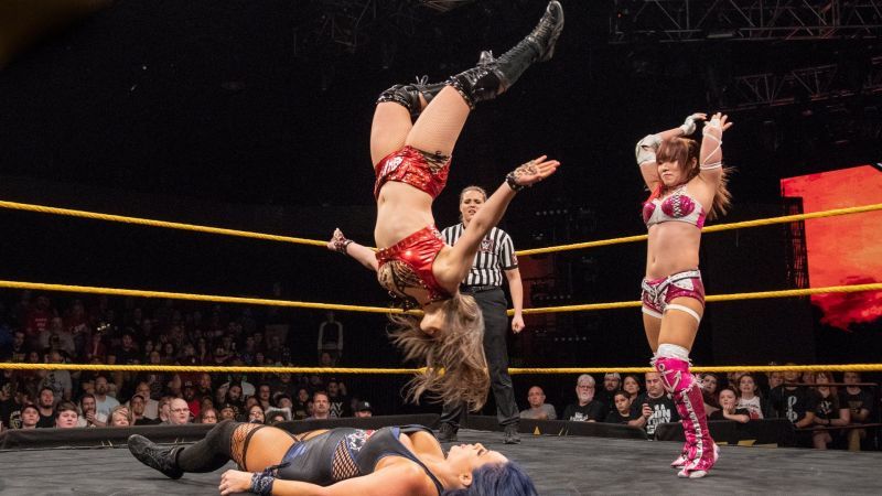 Io Shirai nails a moonsault in an NXT tag match with Kairi Sane
