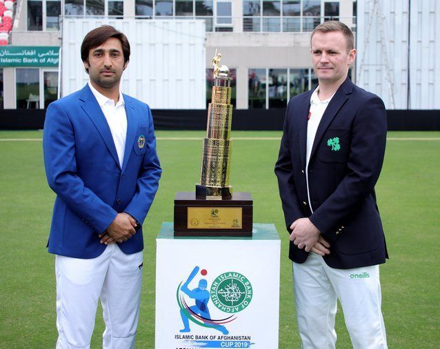 Asghar Afghan &amp; William Porterfield with the test trophy