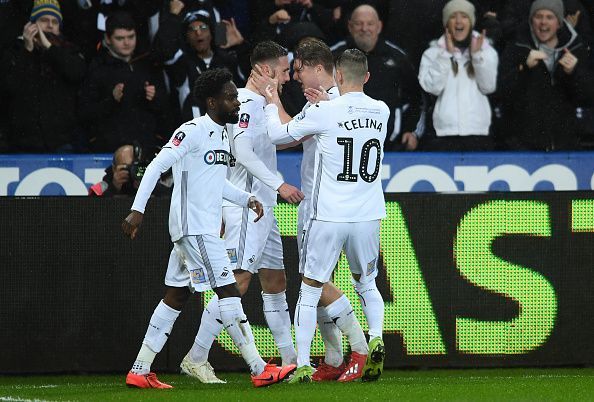 Swansea City celebrating their goal against Manchester City - FA Cup Quarter Final