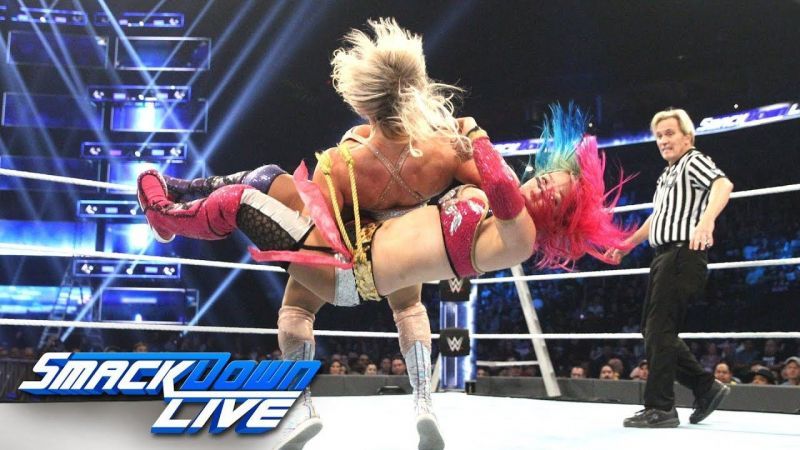 The Empress dethroned by a Queen; Asuka attempts a crucifix on Charlotte.