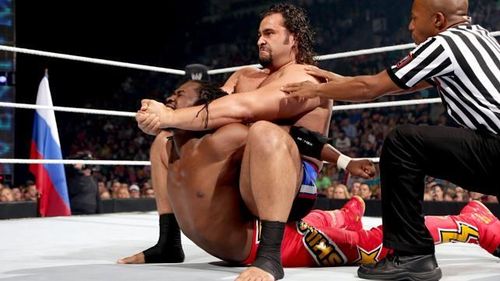 Rusev locking in The Accolade on Kofi