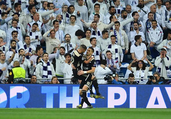 Ziyech celebrates his opener with Tadic as Ajax raced ahead in the second leg