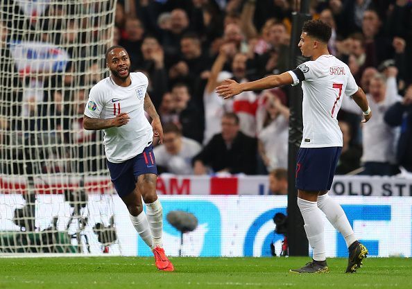 Sterling celebrated with Jadon Sancho after scoring against the Czech Republic