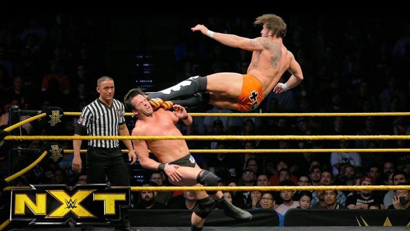 Shane Thorne nails a dropkick on Roderick Strong