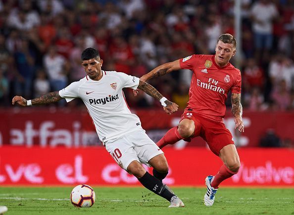 Banega in action against Real Madrid midfielder Toni Kroos