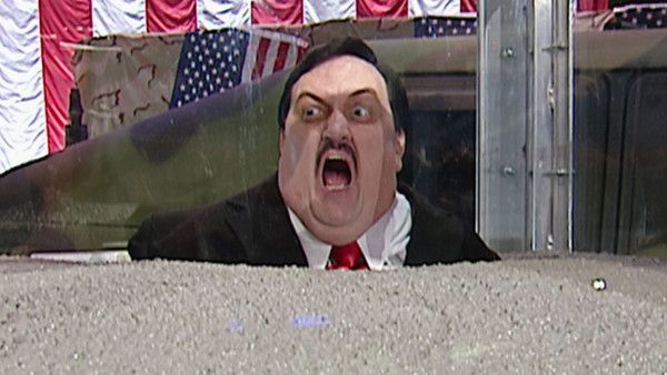 Paul Bearer is buried alive in concrete.