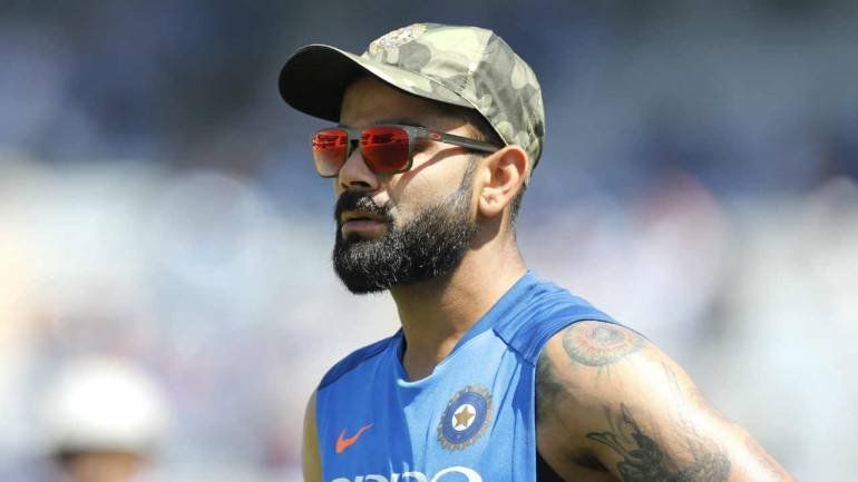 Virat kholi with Indian Army cap