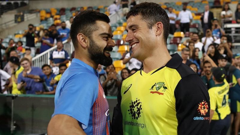 Stoinis with Virat Kohli