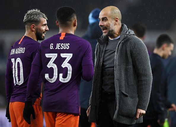 A discussion between Guardiola and Manchester City key players