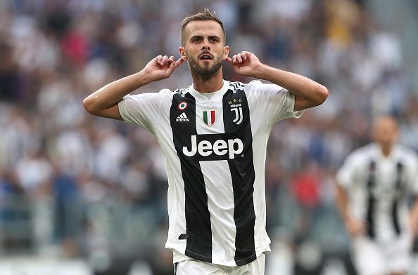 Pjanic celebrates a goal for Juventus