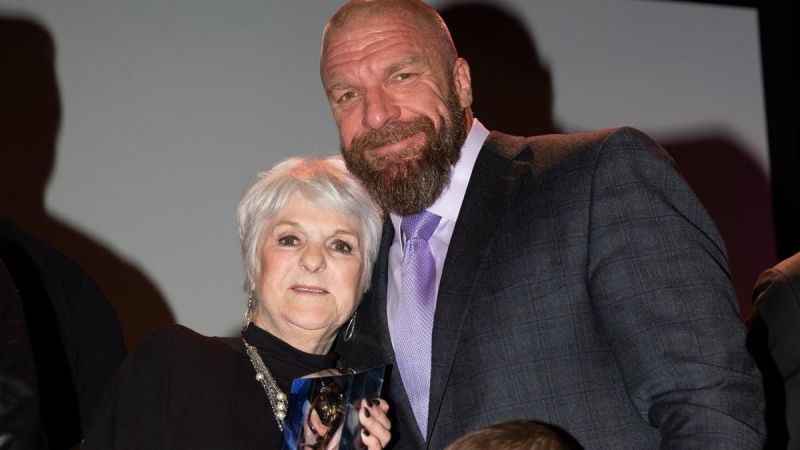2019 Warrior Award recipient Sue Aitchison with Triple H