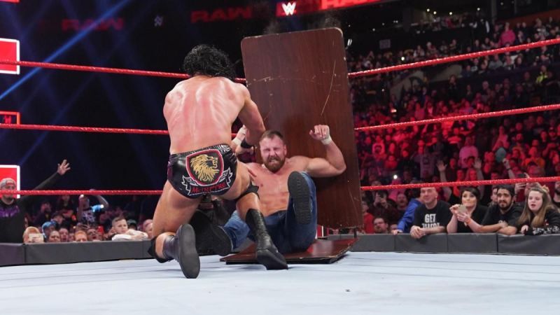 Drew McIntyre threw Dean Ambrose through a table.