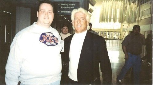 Ric Flair with a happy fan during his WCW days.