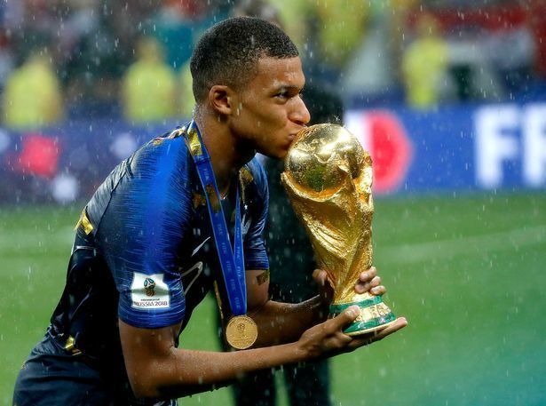 Kylian Mbappe with the FIFA World Cup