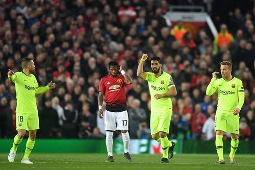 Suarez celebrates after his effort - later credited as a Shaw own goal - was given