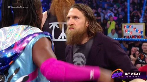 Daniel Bryan staring down Kofi Kingston.