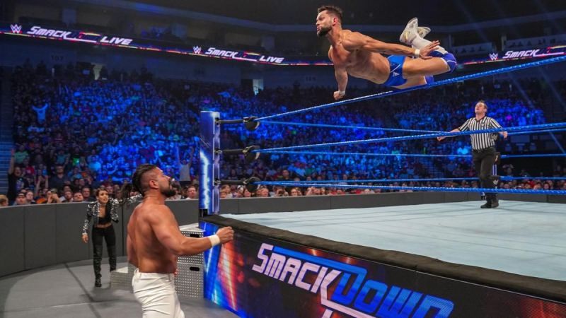 Andrade and Balor in action