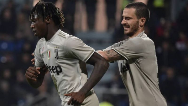 Leonardo Bonucci pulls Moise Kean away from the Cagliari fans