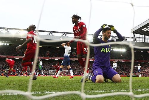 Lloris in disbelief after fumbling Salah's headed effort, watching it trickle and bounce off Alderweireld in