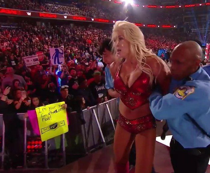 SmackDown Women&#039;s Champion Charlotte Flair leaves RAW in handcuffs