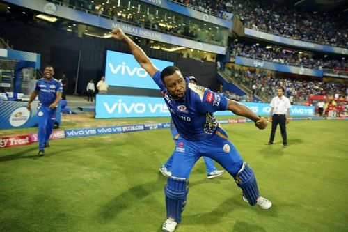 Kieron Pollard celebrates after Mumbai Indians won the game against KXIP [Image: BCCI/IPLT20.com]