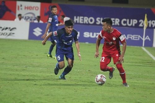 Anirudh Thapa of Chennaiyin FC in a tussle for possession with Reagan Singh of NorthEast United during their Super Cup match