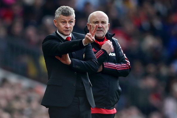 Ole Gunnar Solskjaer (l) and Mike Phelan (r)