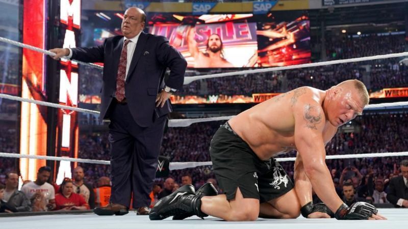 Brock Lesnar and Paul Heyman shortly after Seth Rollins claimed victory