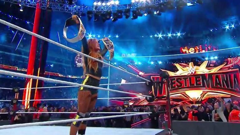 Becky Lynch celebrates after her Wrestlemania 35 win