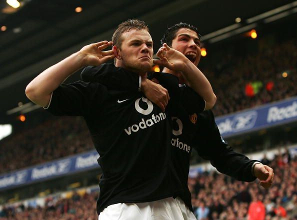 Ronaldo celebrating with Rooney in a Premier League meeting between Liverpool &amp; Manchester United.