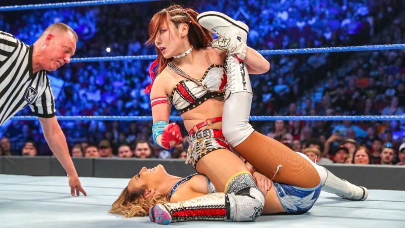 Sane pinned Peyton Royce