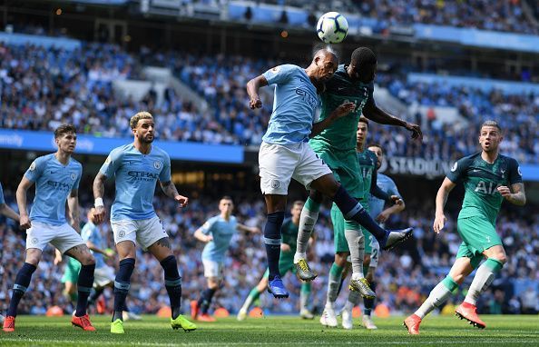 Tottenham&#039;s Davinson Sanchez involved in an aerial duel with Fernandinho of Manchester City
