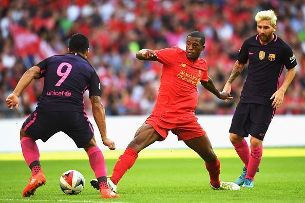 Lionel Messi, Gini Wijnaldum and Luis Suarez