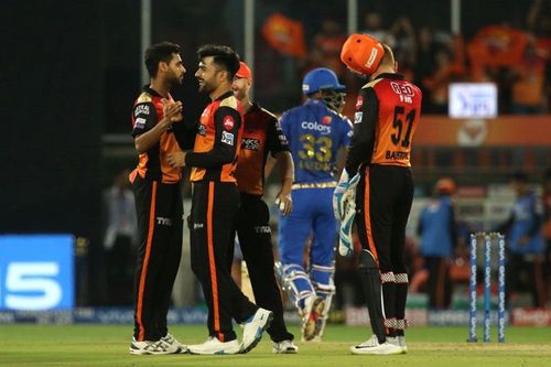 Bhuvneshwar Kumar and Rashid Khan (image courtesy: BCCI/iplt20.com)