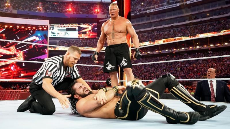 Lesnar punishing Rollins at WrestleMania!