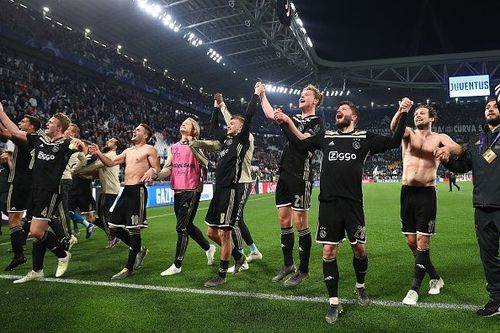 Exuberant Ajax players celebrating their quarter-final victory against Juventus.