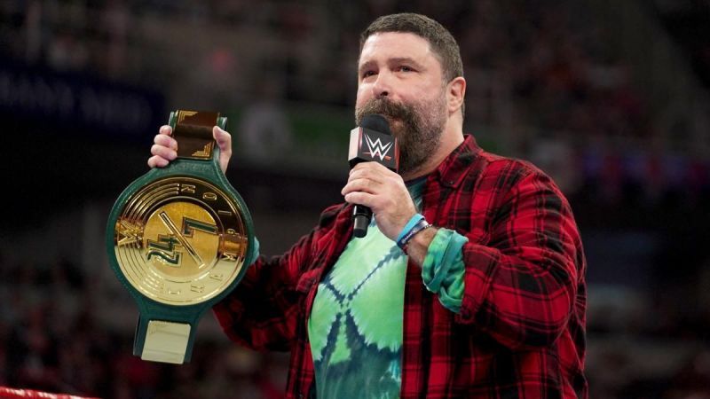 Mick Foley with the WWE 24/7 championship.