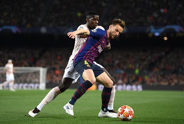 Rakitic tussles with Paul Pogba