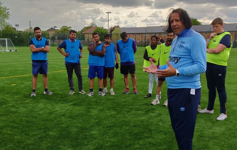 Rashid Abba from West Ham Foundation spends time with the GISB Students on the pitch