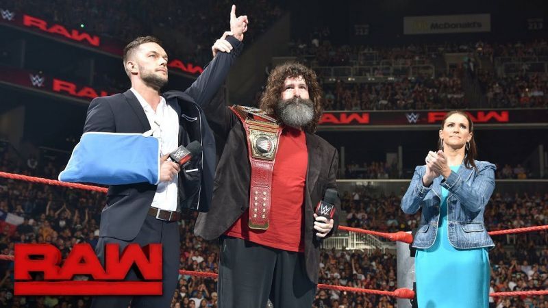 Balor with Foley and Stephanie