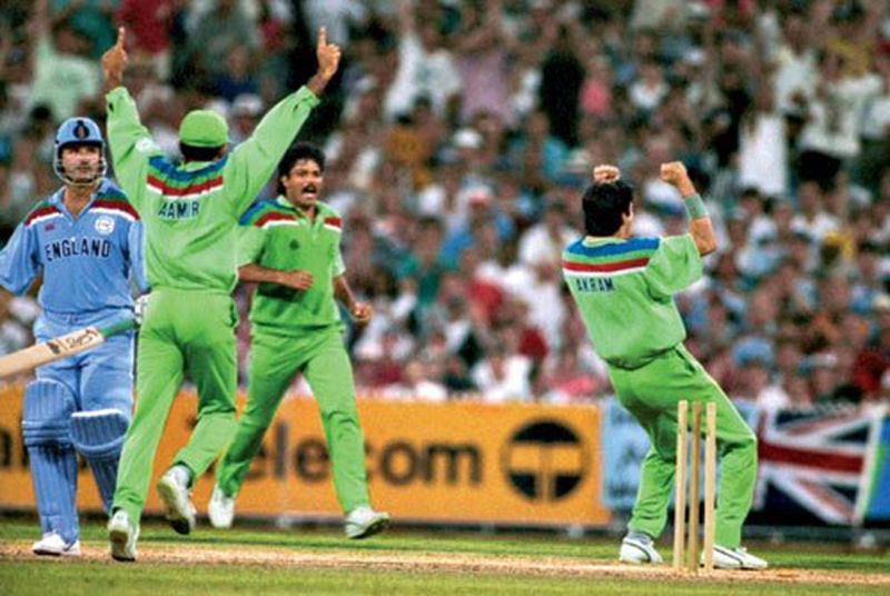 Wasim Akram breaks through, rattling the stumps of Allan Lamb, on the road to the 1992 title