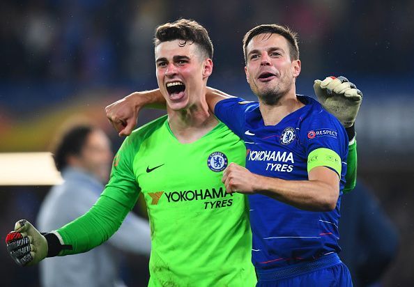 Penalty hero Kepa Arrizabalaga celebrates with captain Cesar Azpilicueta after a late finish at the Bridge