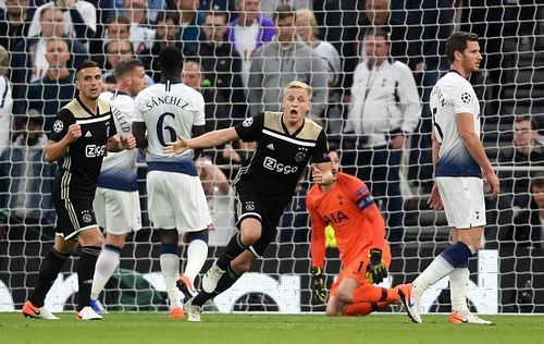 van de Beek wheels away to celebrate his opener in the semi-final first leg