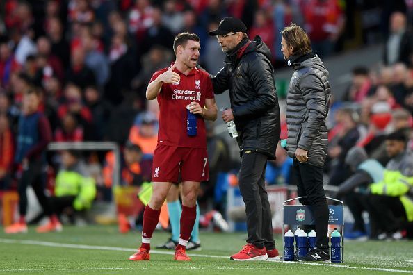 Klopp conveying instructions to one of his on field generals