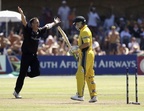 The speedy Shane Bond knocks over Ian Harvey's middle-stump as he bagged 6 wickets for 23 runs.