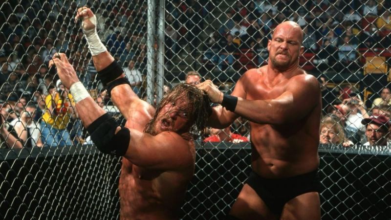 The Game Triple H and Stone Cold Steve Austin may have been rivals, but showed comradeship when a fan attacked the Rattlesnake during a live event in Germany.