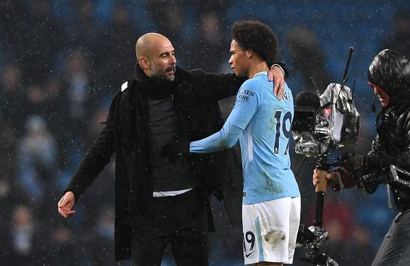 Pep Guardiola and Leroy Sane